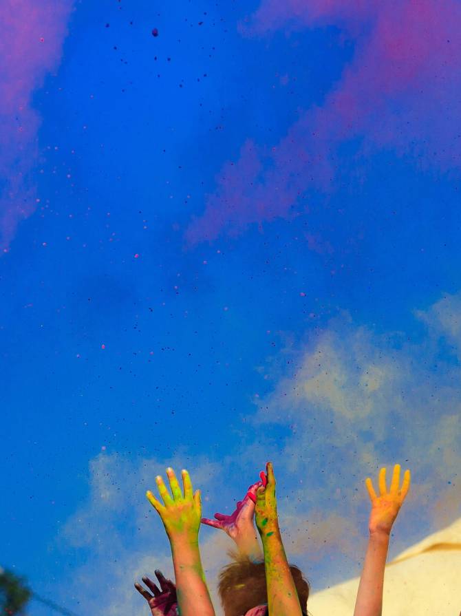 sky view at a color run with powder color flying